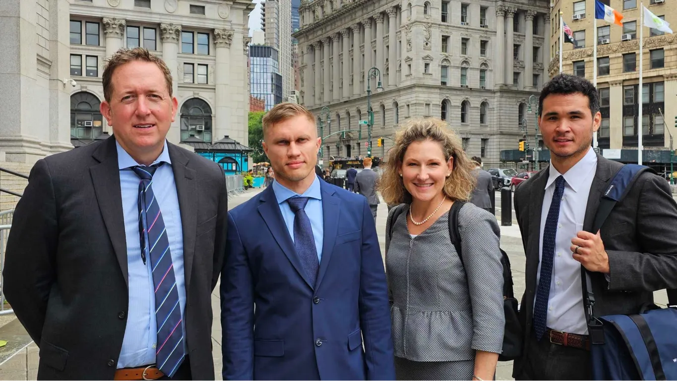 Roman Storm and his lawyers before the hearing