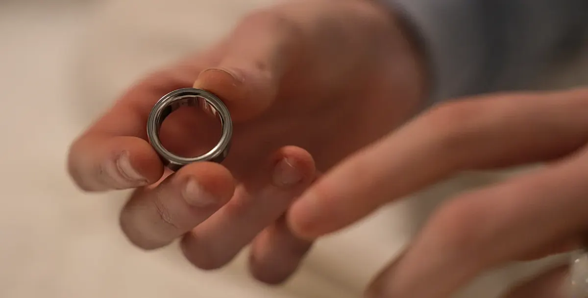A man holding an Oura Ring